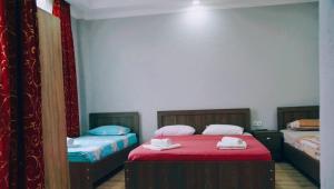 Postel nebo postele na pokoji v ubytování New Batumi