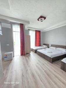 Postel nebo postele na pokoji v ubytování New Batumi + 37 fotografií