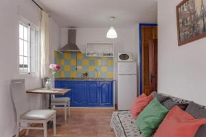 Kuchyň nebo kuchyňský kout v ubytování Apartamento Villa Mayo A