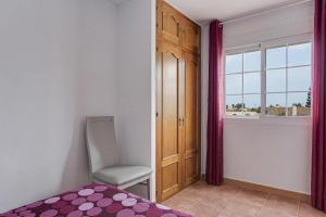Posteľ alebo postele v izbe v ubytovaní Apartamento Villa Mayo C