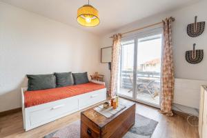 Letto o letti in una camera di Appartement au pied des dunes avec vue