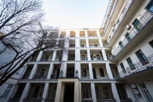 a large white building with a lot of windows at Buda's Hidden Heaven 1 with Private Sauna in Budapest