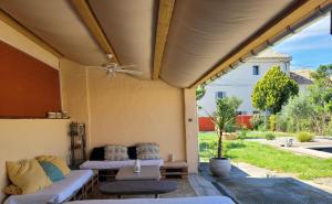 Posezení v ubytování Gîte l'atelier de Phil et Delfe