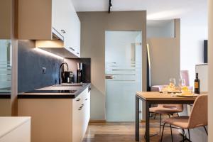 Kuchyň nebo kuchyňský kout v ubytování Appartements Panorama