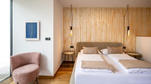 Postel nebo postele na pokoji v ubytování Appartements Panorama