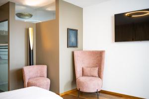 TV a/nebo společenská místnost v ubytování Appartements Panorama