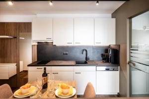 Kuchyň nebo kuchyňský kout v ubytování Appartements Panorama