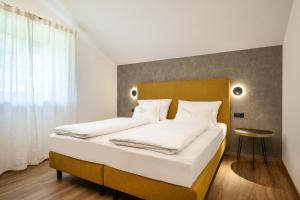 Postel nebo postele na pokoji v ubytování Appartements Panorama