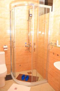 Ein Badezimmer in der Unterkunft Hotel Next