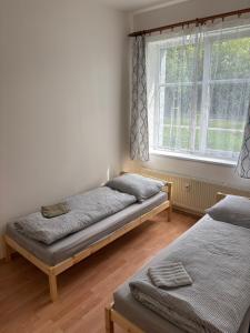 Posteľ alebo postele v izbe v ubytovaní Apartmány Topolová 909B velký