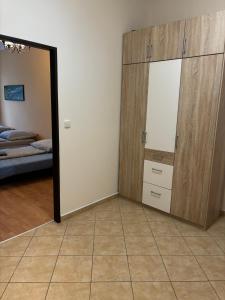 Posteľ alebo postele v izbe v ubytovaní Apartmány Topolová 909B velký