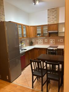 Kuchyňa alebo kuchynka v ubytovaní Apartmány Topolová 909B velký