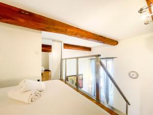 Ένα ή περισσότερα κρεβάτια σε δωμάτιο στο Place Massena 4 Pers AC WiFi