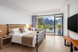 Letto o letti in una camera di Whispering Retreat