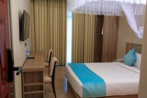 Ein Bett oder Betten in einem Zimmer der Unterkunft Hotel Next