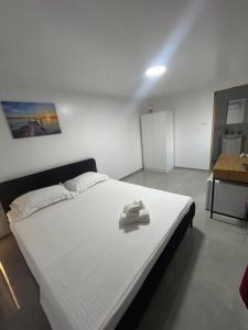 Postel nebo postele na pokoji v ubytování Tiny Hub