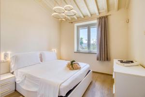 Postel nebo postele na pokoji v ubytování Amazing Villa Chimera Green 12 Pool&Gym - Happy Rentals