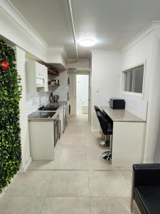 Η κουζίνα ή μικρή κουζίνα στο Apt 9 The New Yorker +3 φωτογραφίες