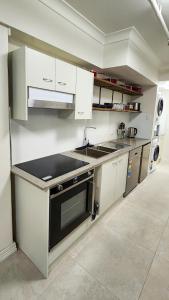 Η κουζίνα ή μικρή κουζίνα στο Apt 9 The New Yorker