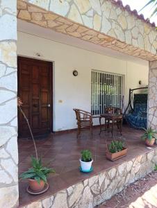 Kawasan patio atau luaran di Casa in giardino a pochi passi dal Mare +31 gambar