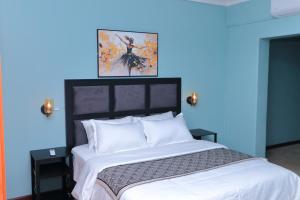 Ένα ή περισσότερα κρεβάτια σε δωμάτιο στο Beemoka Bed & Breakfast
