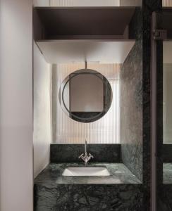 Kúpeľňa v ubytovaní Lazzru Suites