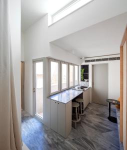 Fotografia z galérie ubytovania Lazzru Suites v destinácii Cospicua