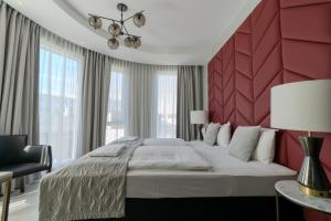 Ένα ή περισσότερα κρεβάτια σε δωμάτιο στο Midtown Hotel