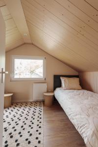 Postel nebo postele na pokoji v ubytování Casa Costeira Julianadorp