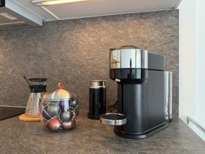 a coffee maker sitting on top of a kitchen counter at Exclusive Holiday - Edifico Paraiso Maspalomas in San Fernando