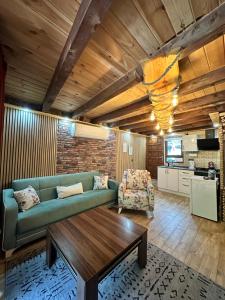A kitchen or kitchenette at Nehir Bungalows
