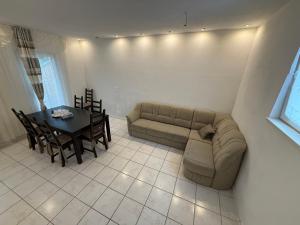 a living room with a couch and a table at Unterkunft 20 Feld Str in Schwabach