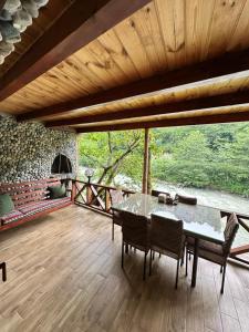 A balcony or terrace at Nehir Bungalows
