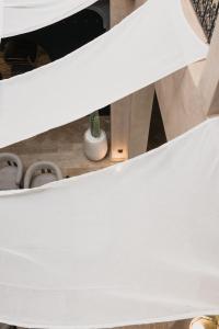 a table with a white table cloth on it at Marrakech Villa with Private Pool & Family-Friendly in Marrakesh