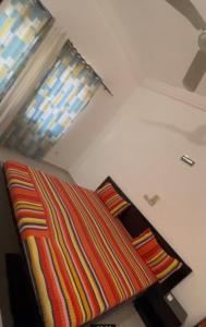 Postel nebo postele na pokoji v ubytování Cleanguesthouse + 3 fotografie