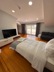Postel nebo postele na pokoji v ubytování İstanbul Guesthouse