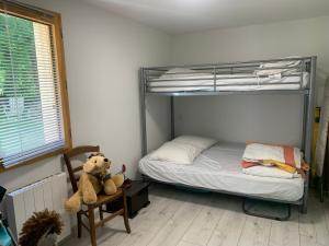 Postel nebo postele na pokoji v ubytování Gîte dans maison Quercynoise