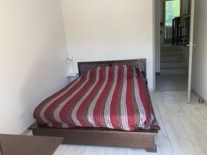 Postel nebo postele na pokoji v ubytování Gîte dans maison Quercynoise