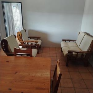 a waiting room with chairs and a couch at Heights in Cedara