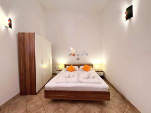 Posteľ alebo postele v izbe v ubytovaní Top Apartments