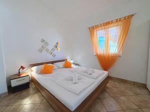 Posteľ alebo postele v izbe v ubytovaní Top Apartments