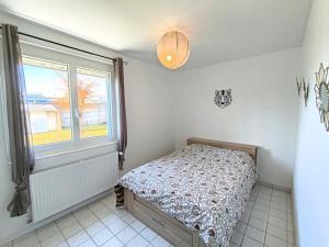 Posteľ alebo postele v izbe v ubytovaní Maison - terrasse - 2 chambres - Aurillac