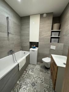 Koupelna v ubytování Apartament Złota 15 + 8 fotografií