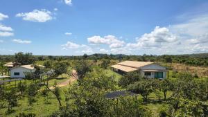 an aerial view of a house in a field at Selah Estação Ecológica in Cocalzinho de Goias