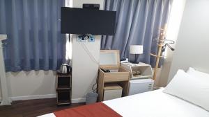 Postel nebo postele na pokoji v ubytování MAYONE HOTEL Myeongdong