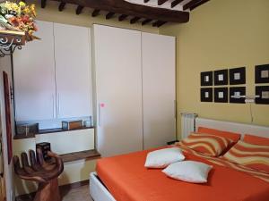 A bed or beds in a room at IL TROTTAPIANO HOME