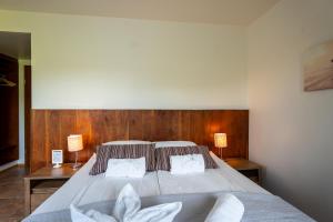 En eller flere senger på et rom på Hotel Skógá by EJ Hotels