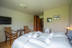 En eller flere senger på et rom på Hotel Skógá by EJ Hotels