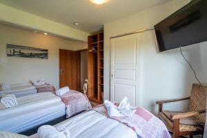 En eller flere senger på et rom på Hotel Skógá by EJ Hotels