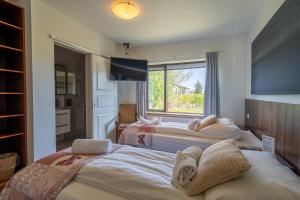 En eller flere senger på et rom på Hotel Skógá by EJ Hotels